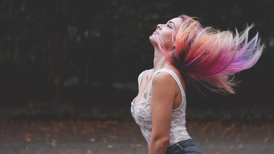 A woman with multi coloured hair